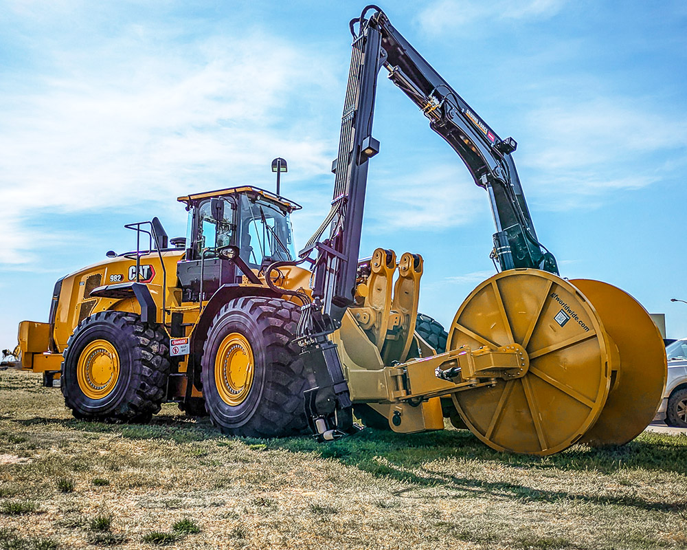 Cable reeler attachment for CAT 982 wheel loader